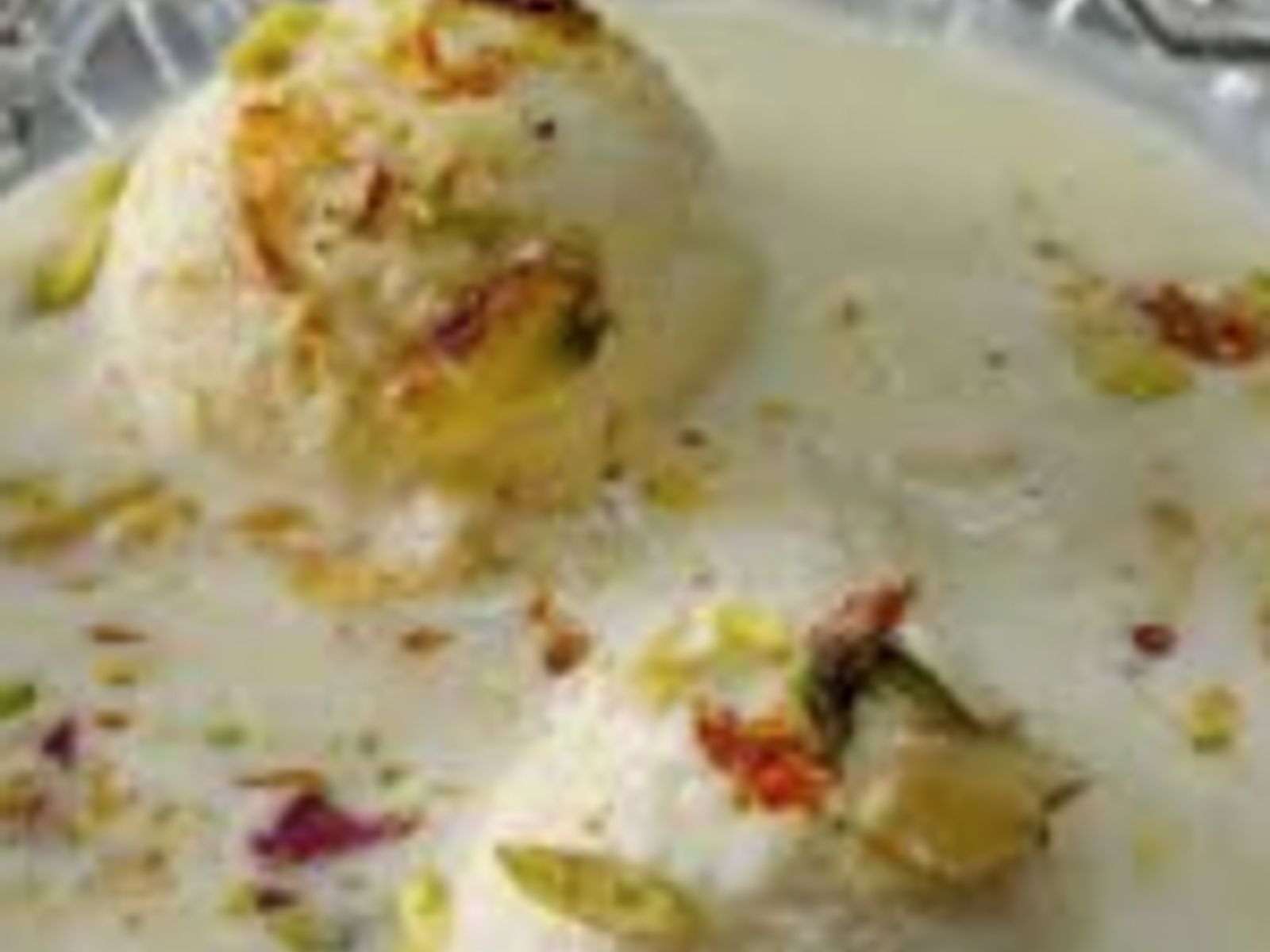 Order Ras Malai ( 2 Pieces) food online from Curry Home store, Pittsburgh on bringmethat.com