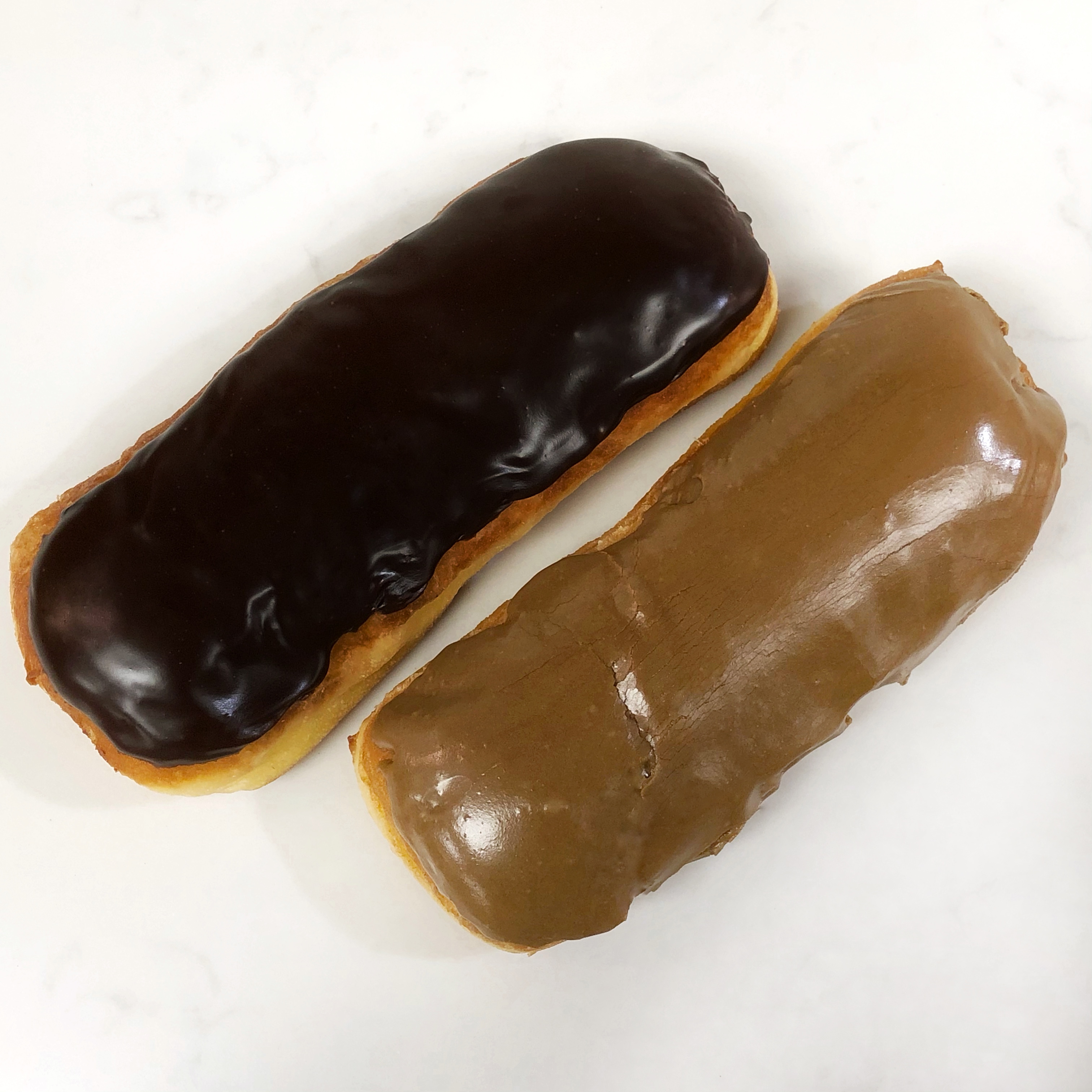 Order Chocolate Long John food online from The Donuttery store, Huntington Beach on bringmethat.com