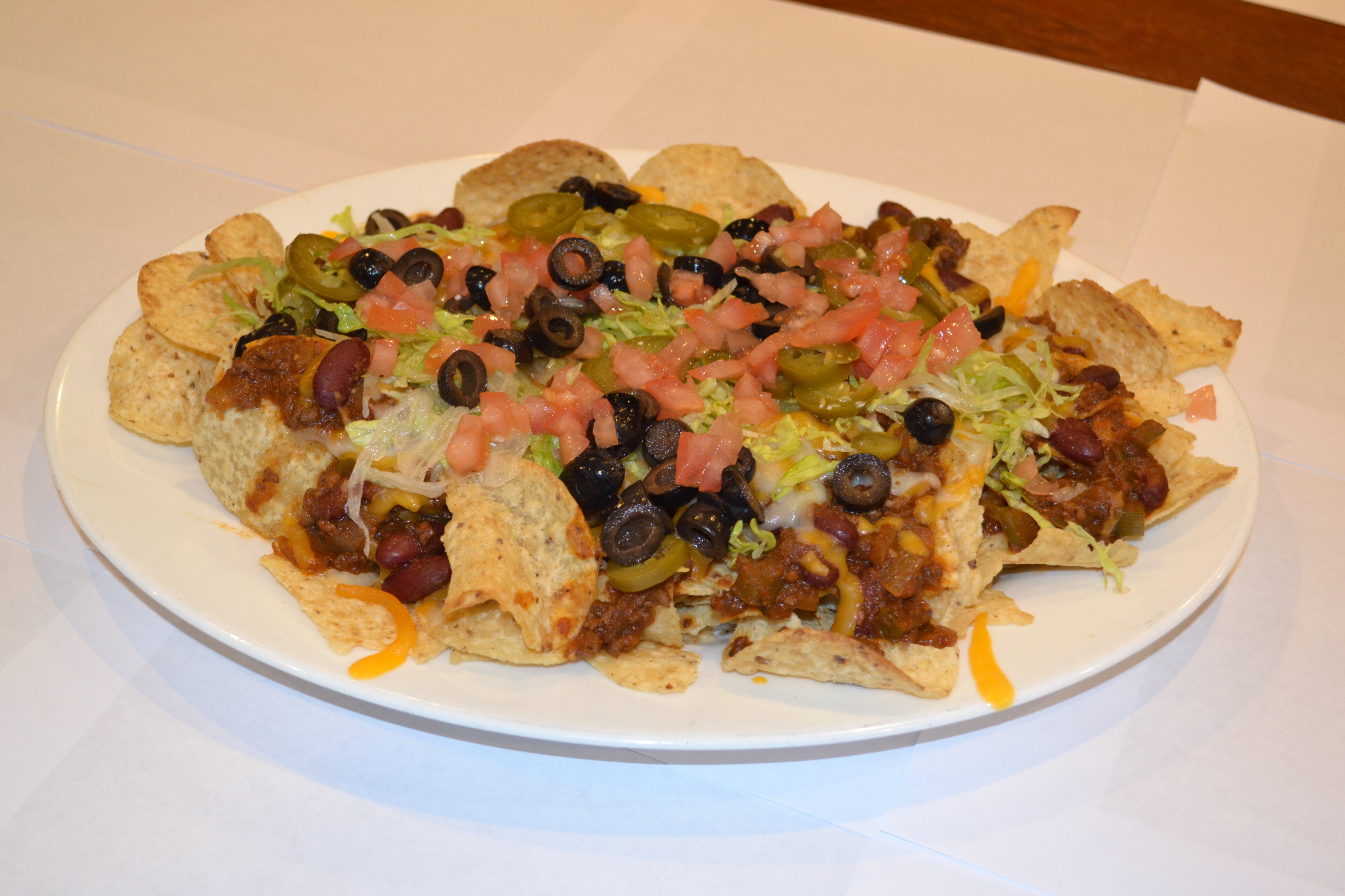 Order Beef Nachos - Appetizer food online from Town Pub store, Bloomfield on bringmethat.com