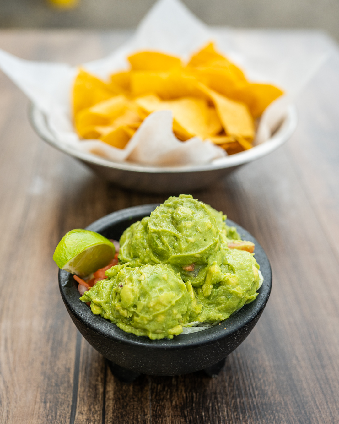 Order Fresh Guacamole Appetizer  (Includes Chips) food online from Chile Verde Cafe - Northwest store, Columbus on bringmethat.com