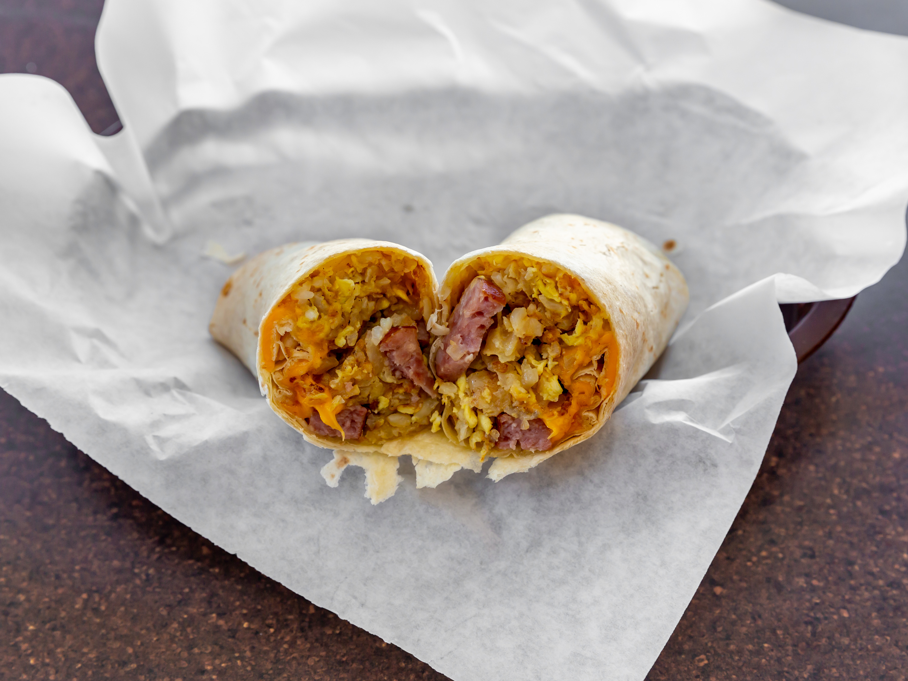 Order Sausage, Egg and Cheese Breakfast Burrito food online from Sunrise Donuts & Bakery store, La Habra on bringmethat.com