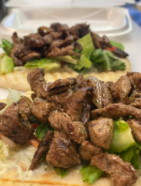 Order Beef Shawarma Sandwich food online from Dijlah Market & Grill store, Raleigh on bringmethat.com