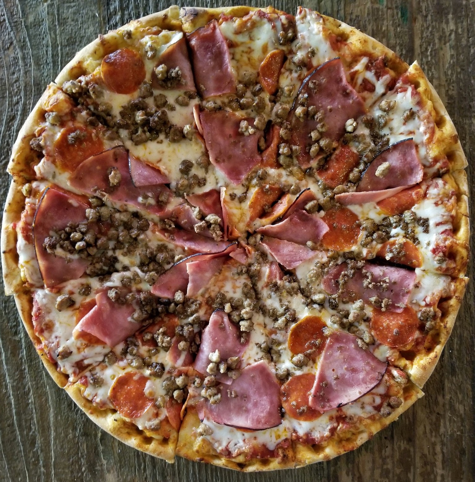 Order Meat Lovers Pizza food online from High Park Tap House store, Mission Viejo on bringmethat.com
