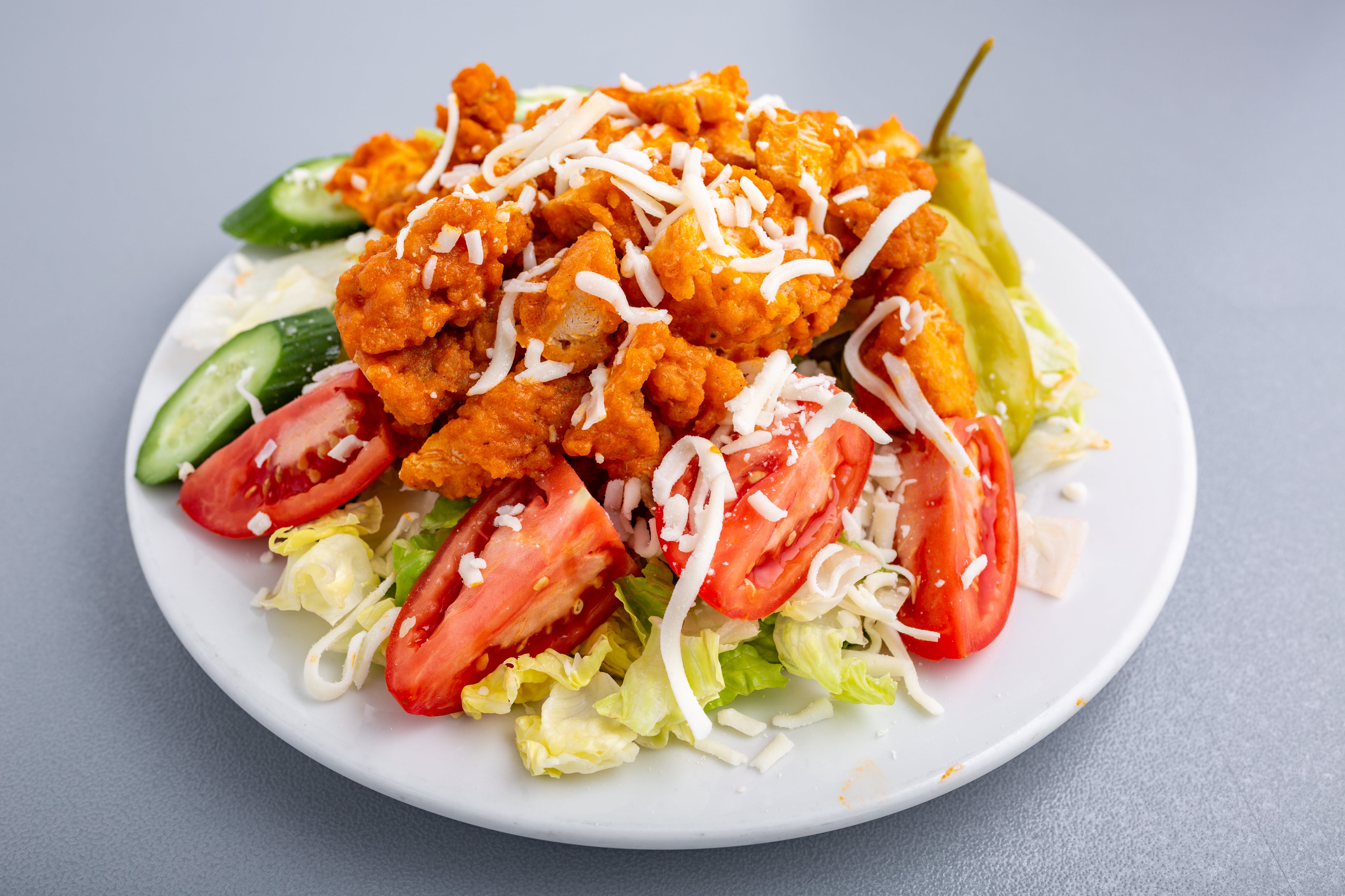 Order Buffalo Crispy Chicken Salad - Salad food online from Napoli Pizza store, Henderson on bringmethat.com