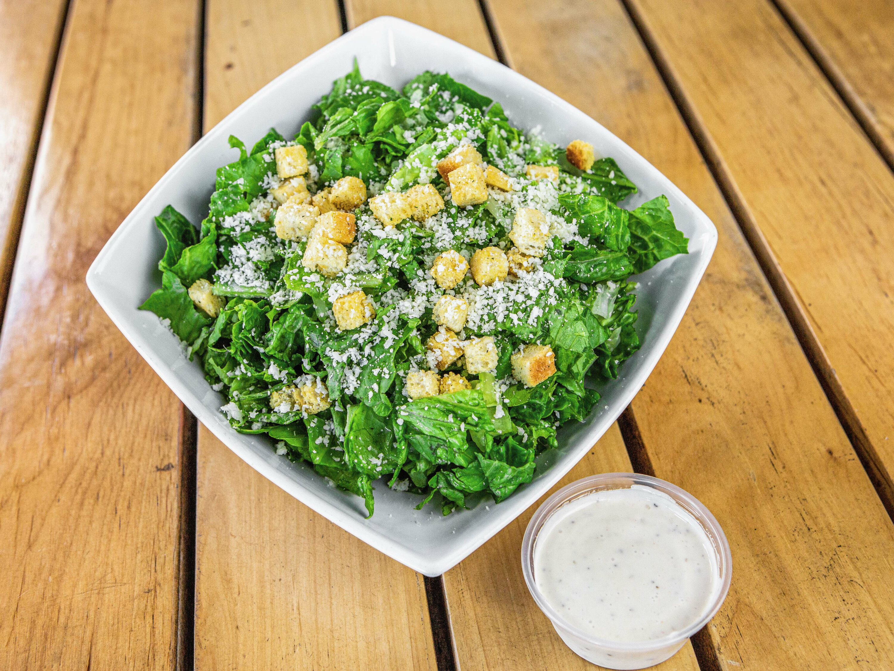 Order Caesar Salad food online from The Mediterranean Kitchen store, Los Angeles on bringmethat.com