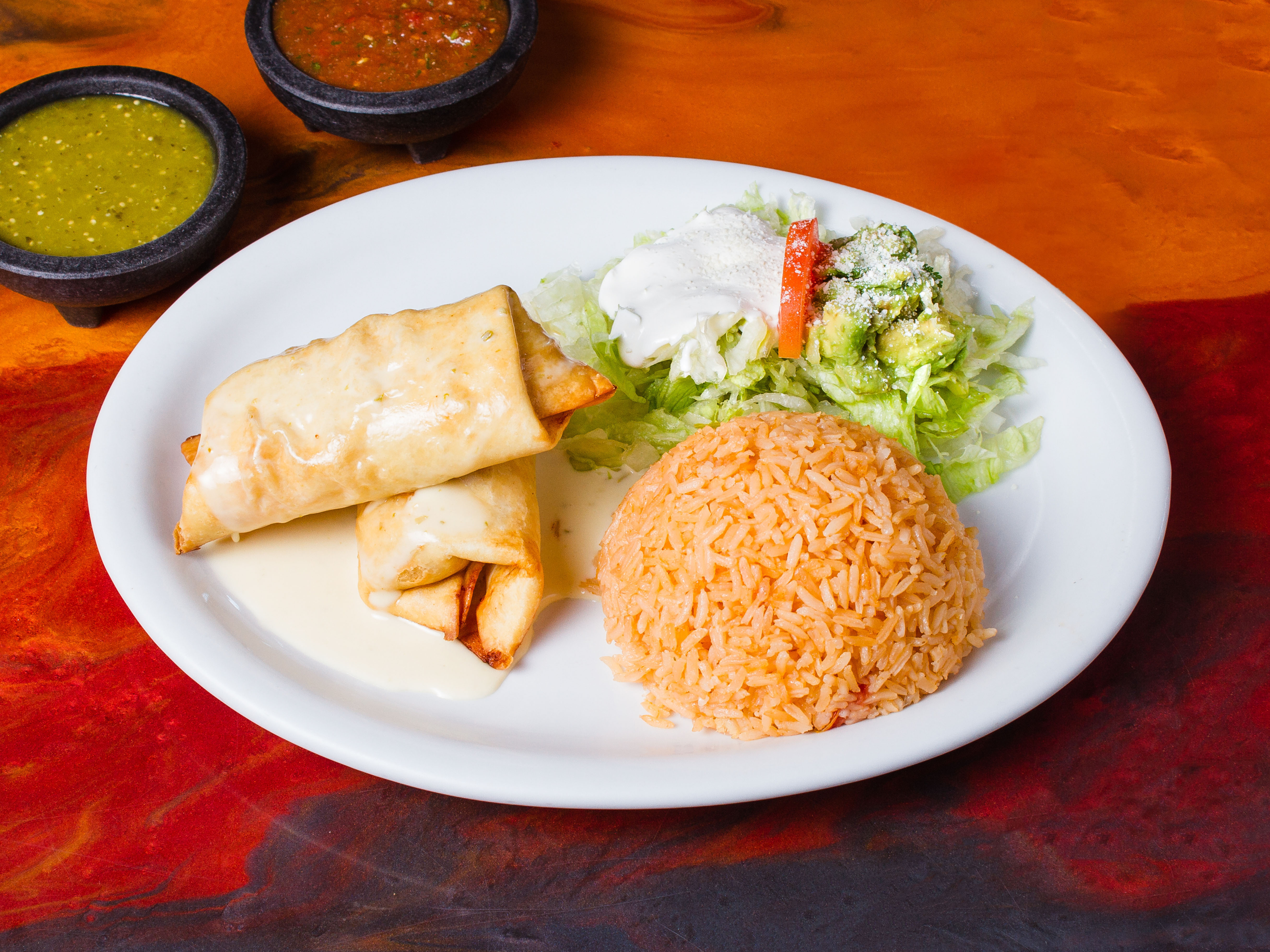 Order Chicken Chimichanga food online from Plaza Del Sol store, Norfolk on bringmethat.com