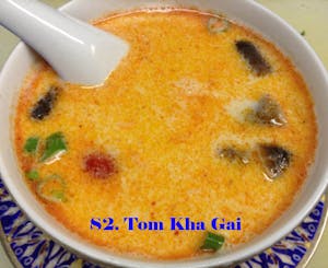 Order S2. Tom Khar Gai food online from Bua Thai Restaurant store, Old Orchard Beach on bringmethat.com