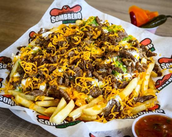Order Carne Asada Fries-Full food online from Sombrero Mexican Food store, San Diego on bringmethat.com