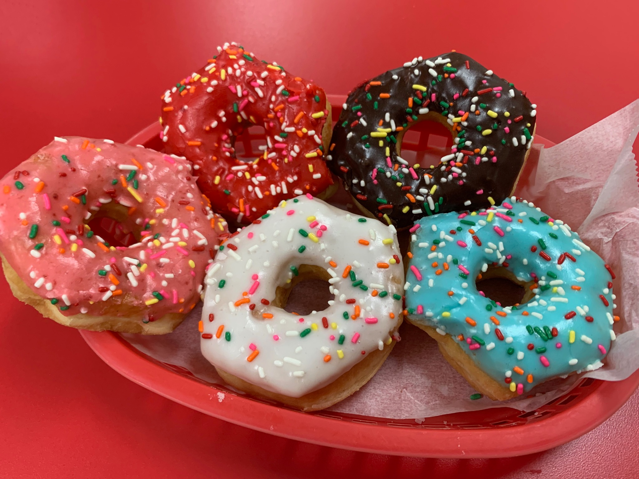 Order 1 Dozen Iced Donuts food online from Shipley Do-Nuts store, Waco on bringmethat.com