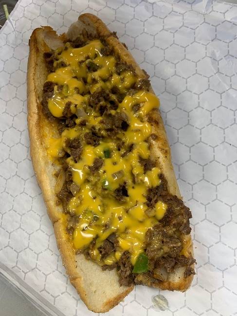 Order Whiz whipped (9oz of Philly Cheesesteak meat on a  Amoroso roll )with peppers and onions food online from From Philly To Charlit store, Charlotte on bringmethat.com