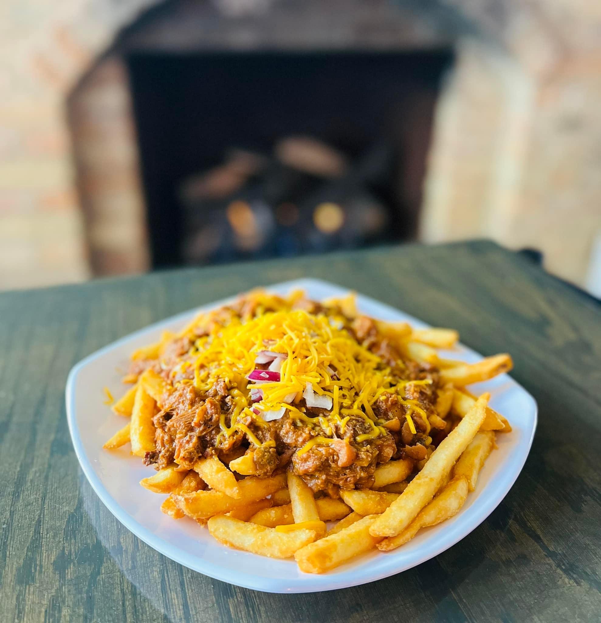 Order Chili Fries food online from Puck Pub store, Lake Bluff on bringmethat.com