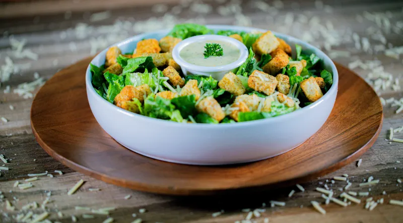 Order Caesar Salad food online from Ski and Benny Pizza store, Anchorage on bringmethat.com