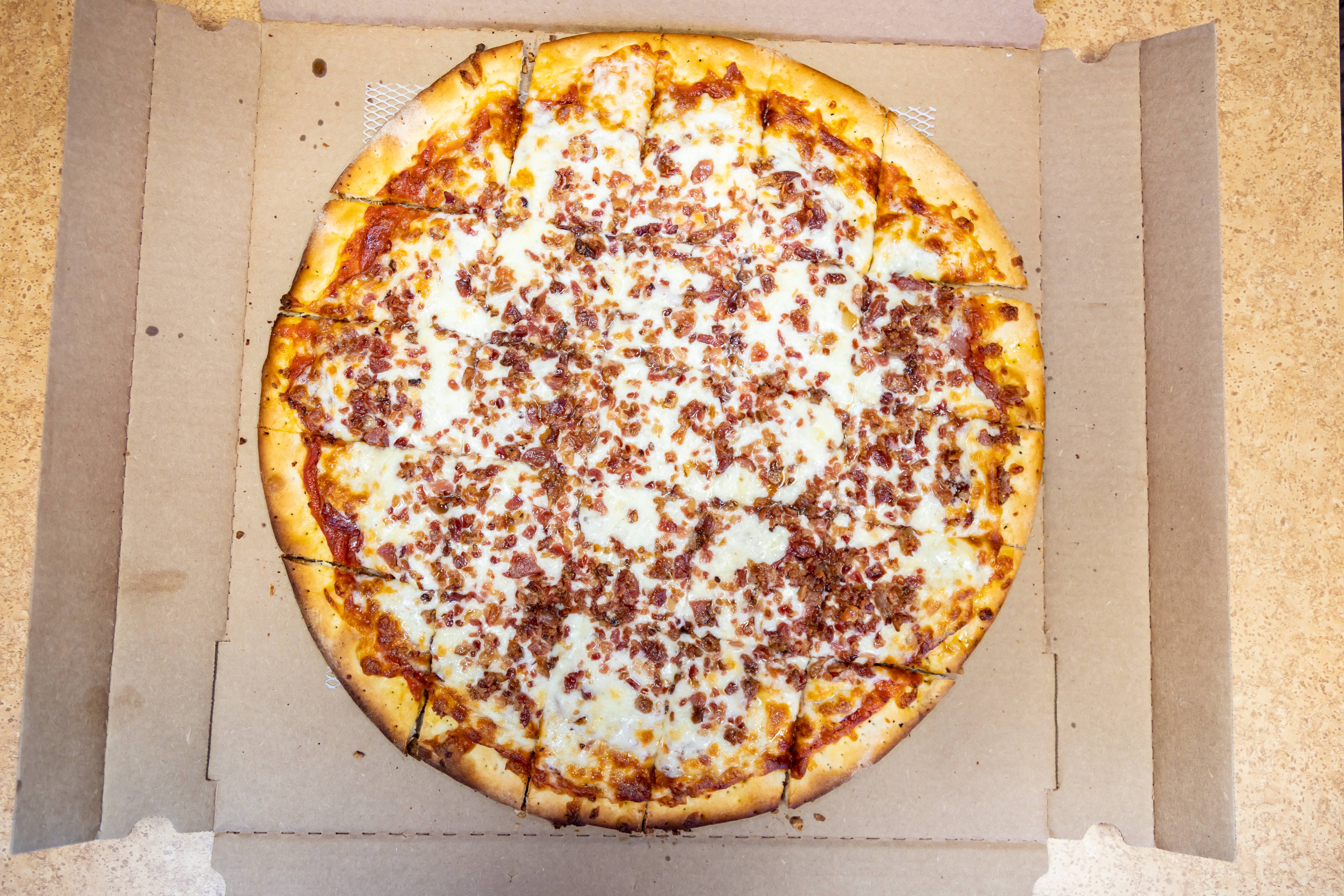 Order Meat Lover's Pizza - Small 12" (Serves 2-3 People) food online from Mario Pizza store, North Aurora on bringmethat.com