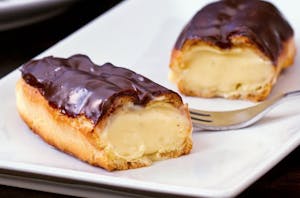 Order Eclairs - Filled Long John food online from Daylight Donuts Op store, Overland Park on bringmethat.com