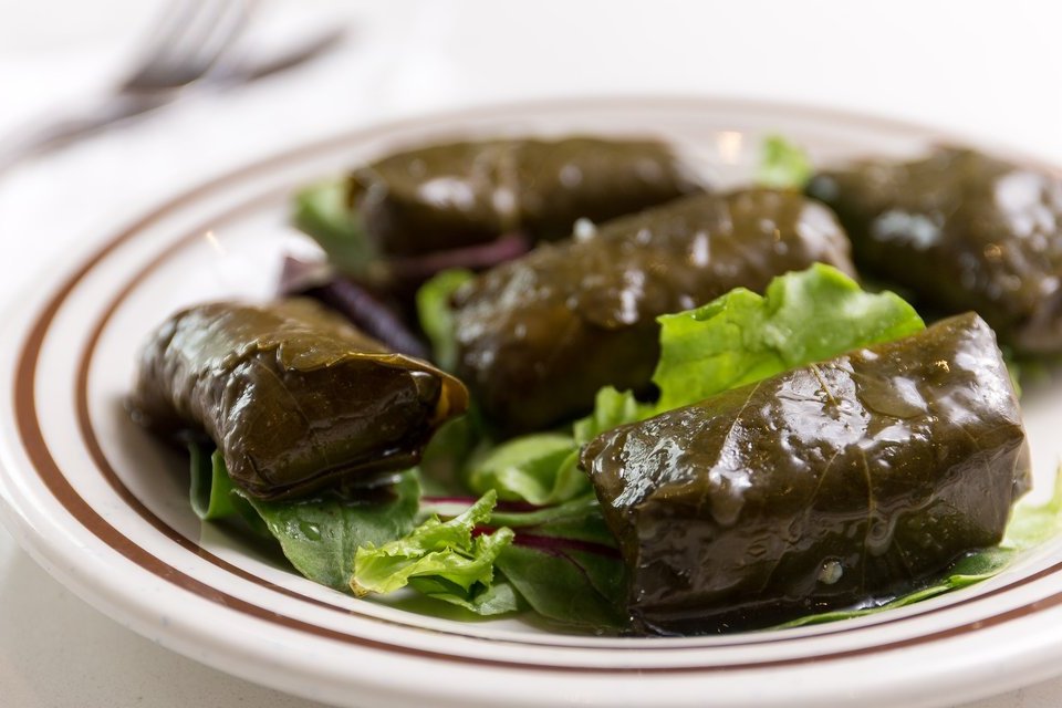 Order Side Dolma food online from Apola Greek Grill store, Irvine on bringmethat.com