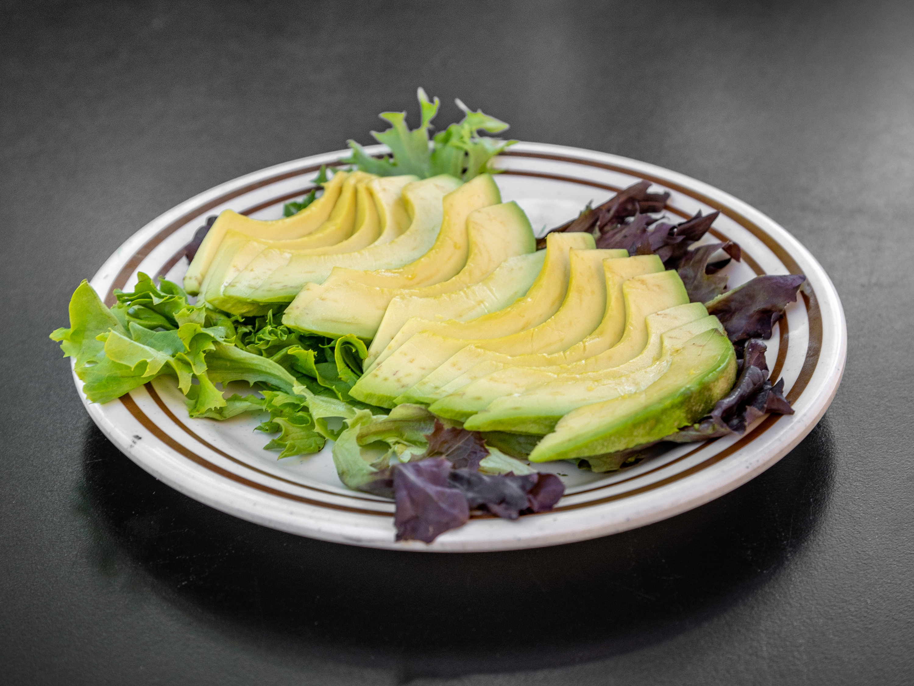Order Side Avocado food online from Apola Greek Grill store, Irvine on bringmethat.com
