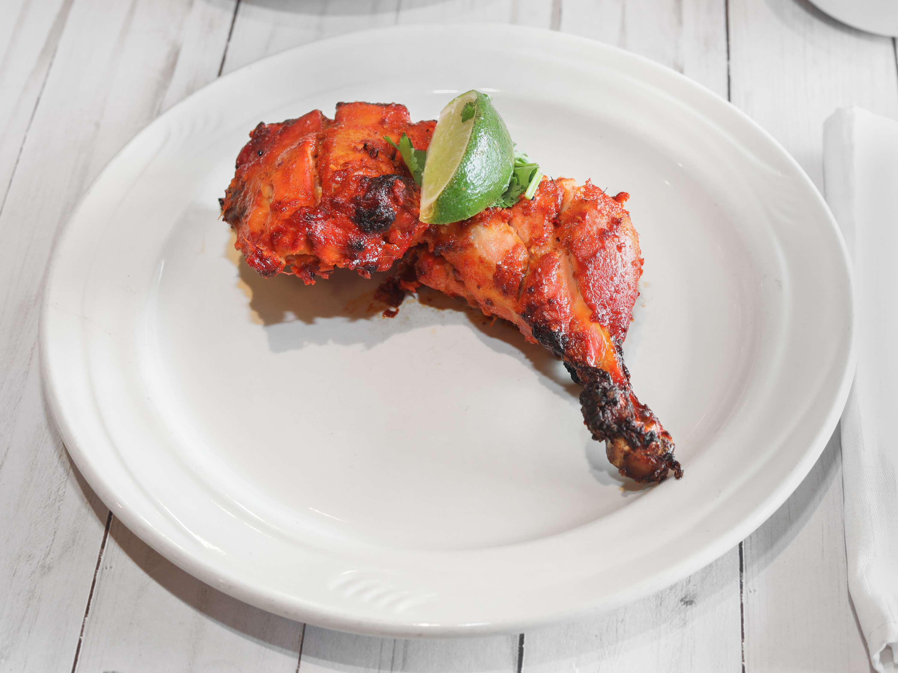 Order Chicken Tikka Leg food online from The Mughals store, Norcross on bringmethat.com