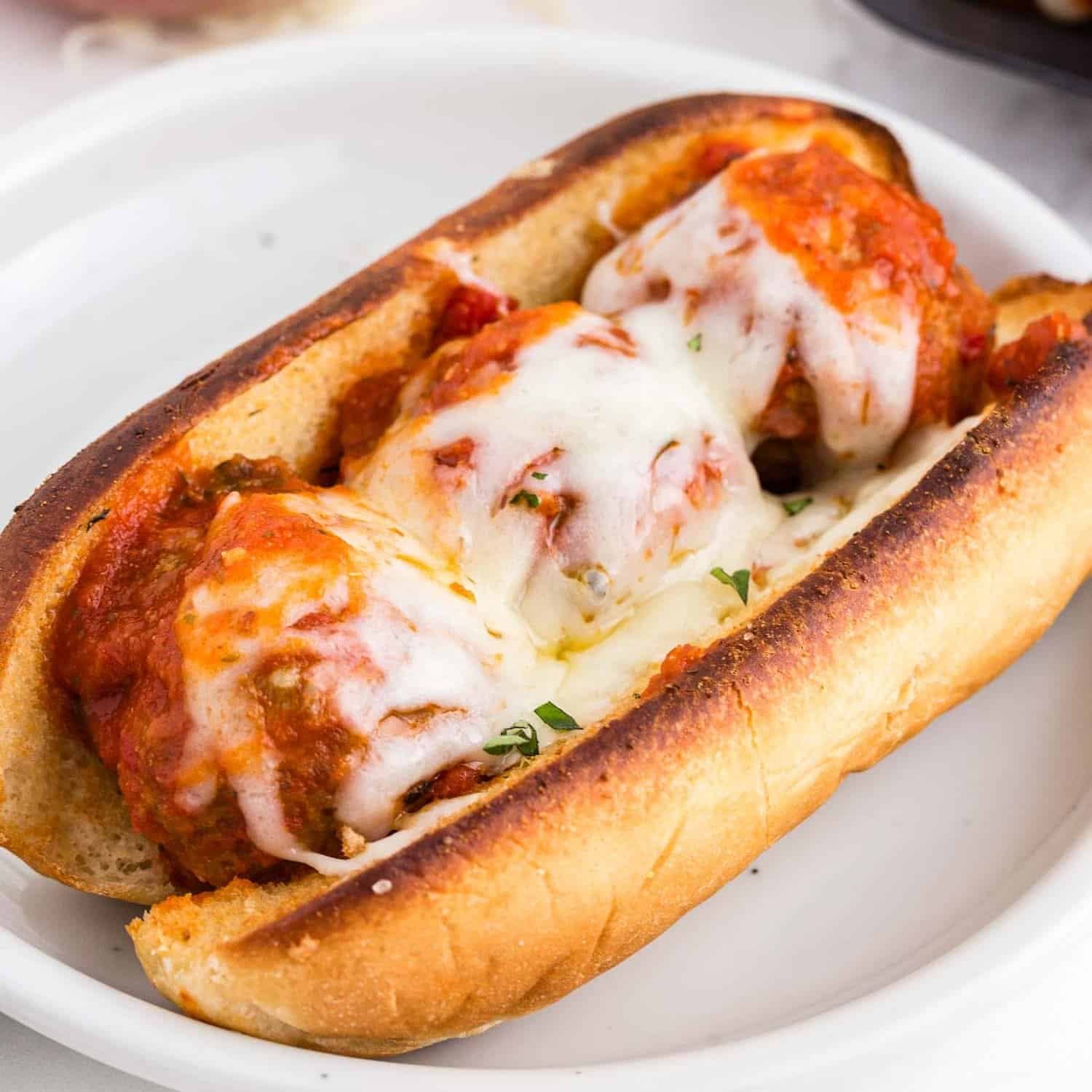 Order Meatball Parmigiana Sandwich - 9" food online from Tani Pizza store, Butler on bringmethat.com