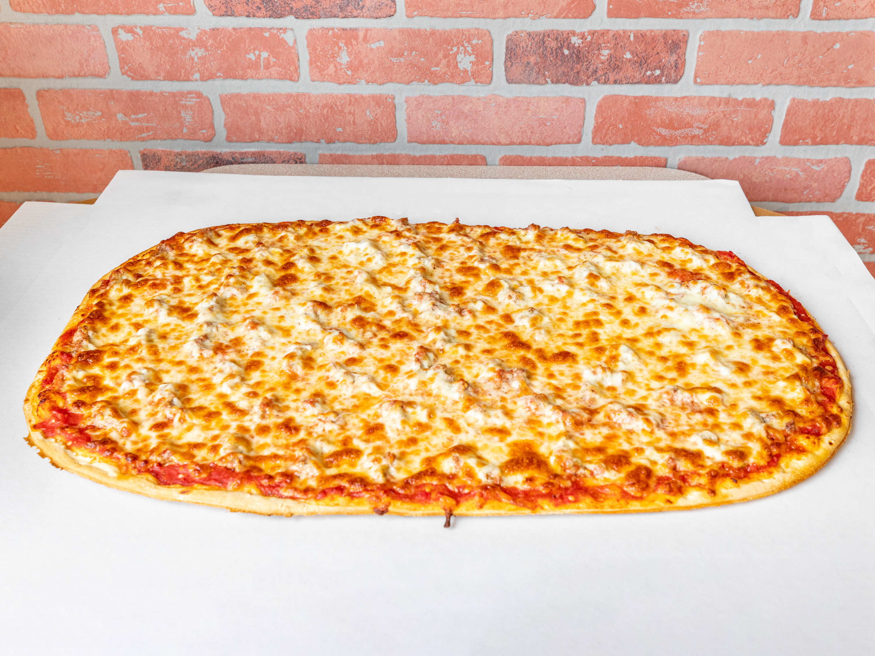 Order Football Cheese Pizza  food online from Als Pizzeria store, North Riverside on bringmethat.com