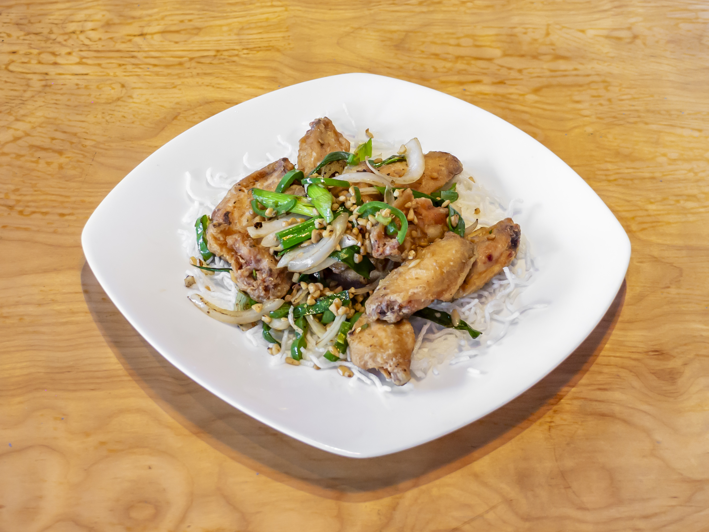 Order 5. Salt and Pepper Chicken Wing food online from Mikado Bistro store, Brentwood on bringmethat.com