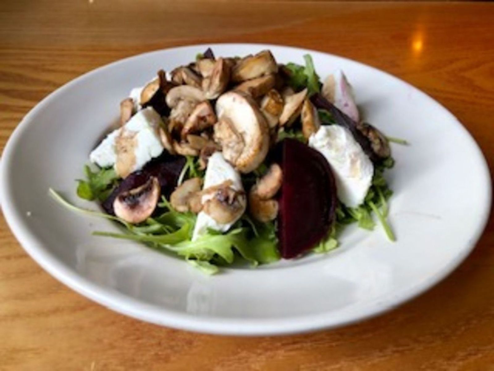 Order Herbed Goat Cheese Salad  food online from Bus stop cafe store, New York on bringmethat.com