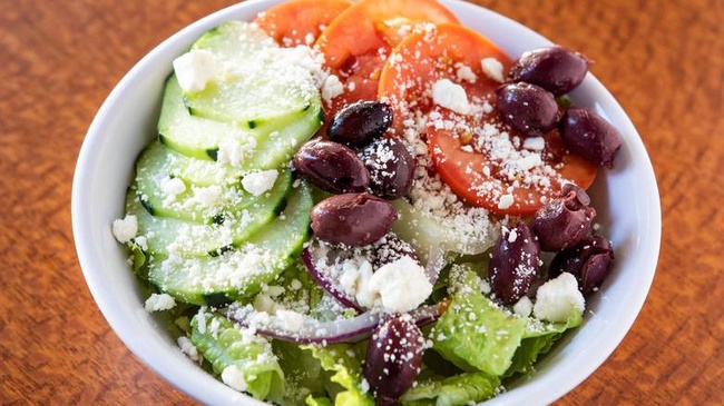 Order Greek Salad food online from New York Pizza store, Palo Alto on bringmethat.com
