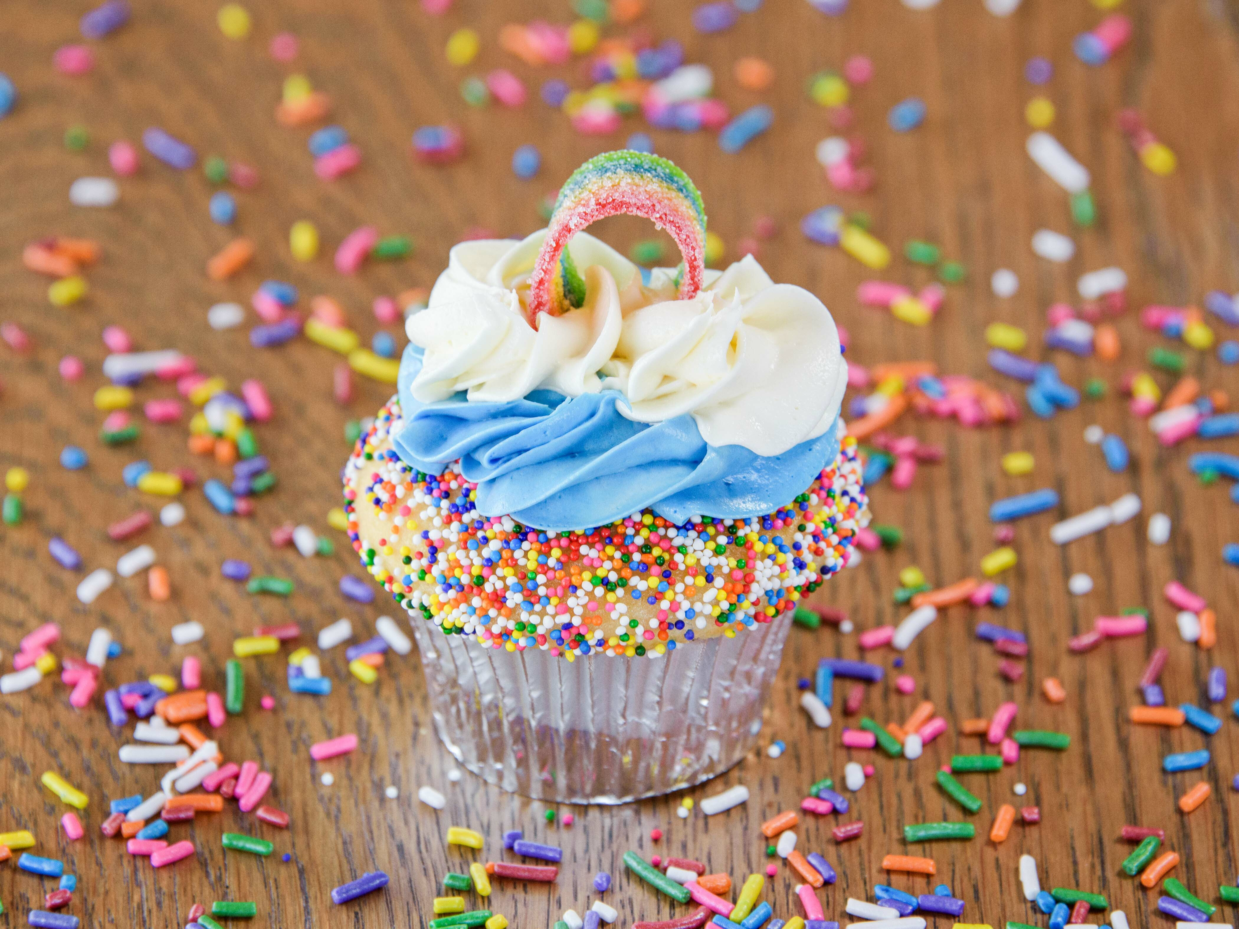 Order Rainbow Candy Cupcake food online from Simply Cakes And Cupcakes store, Mission Viejo on bringmethat.com