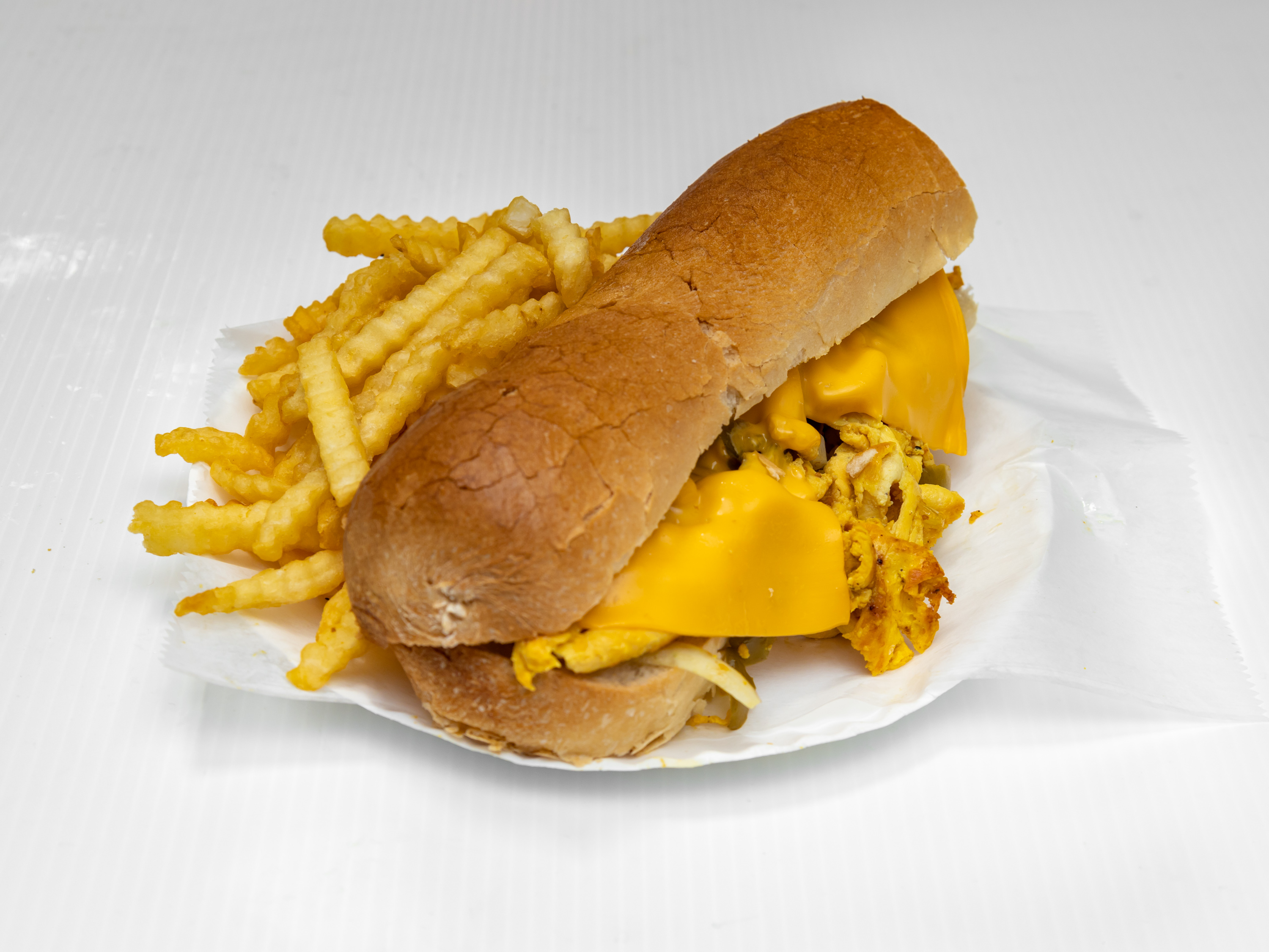 Order #15. Chicken Cheesesteak Combo food online from Crown Fried Chicken store, Newark on bringmethat.com