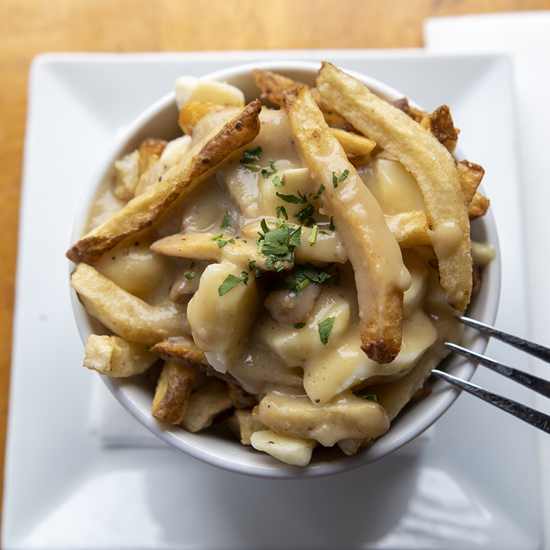Order  Poutine-Single Portion food online from Ashley's Restaurant store, Ann Arbor on bringmethat.com