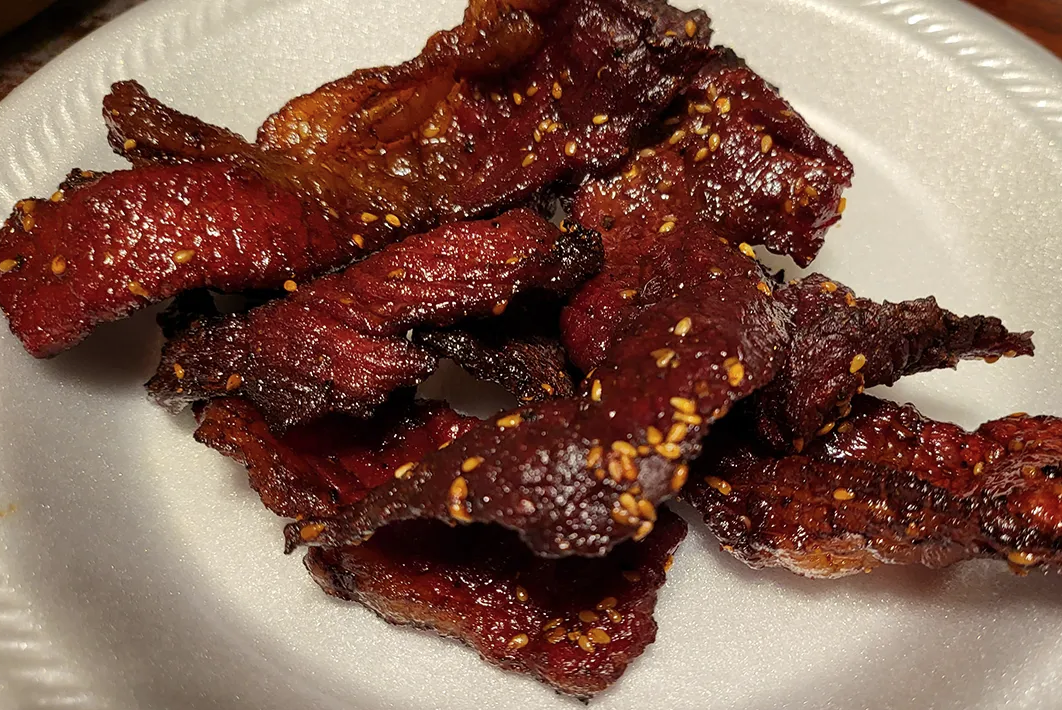 Order A05. Heavenly Beef Jerky food online from Pho Vieng store, Fort Worth on bringmethat.com