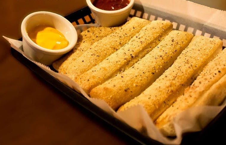 Order Breadsticks - Appetizer food online from Grandslam Pizza store, Monroeville on bringmethat.com