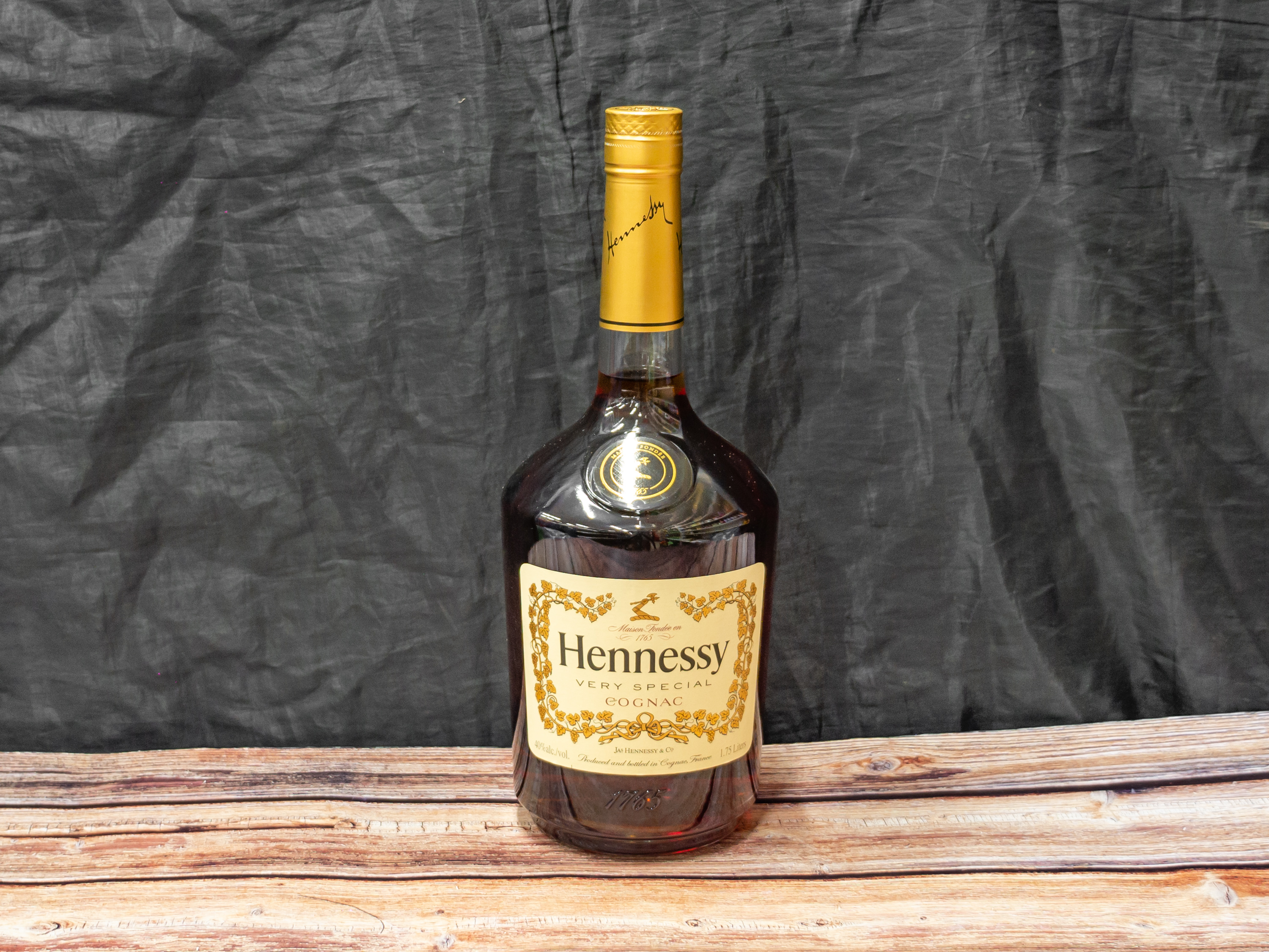 Order 1. Hennessy 1.75 ml food online from Eden Liquor & Deli store, Hayward on bringmethat.com