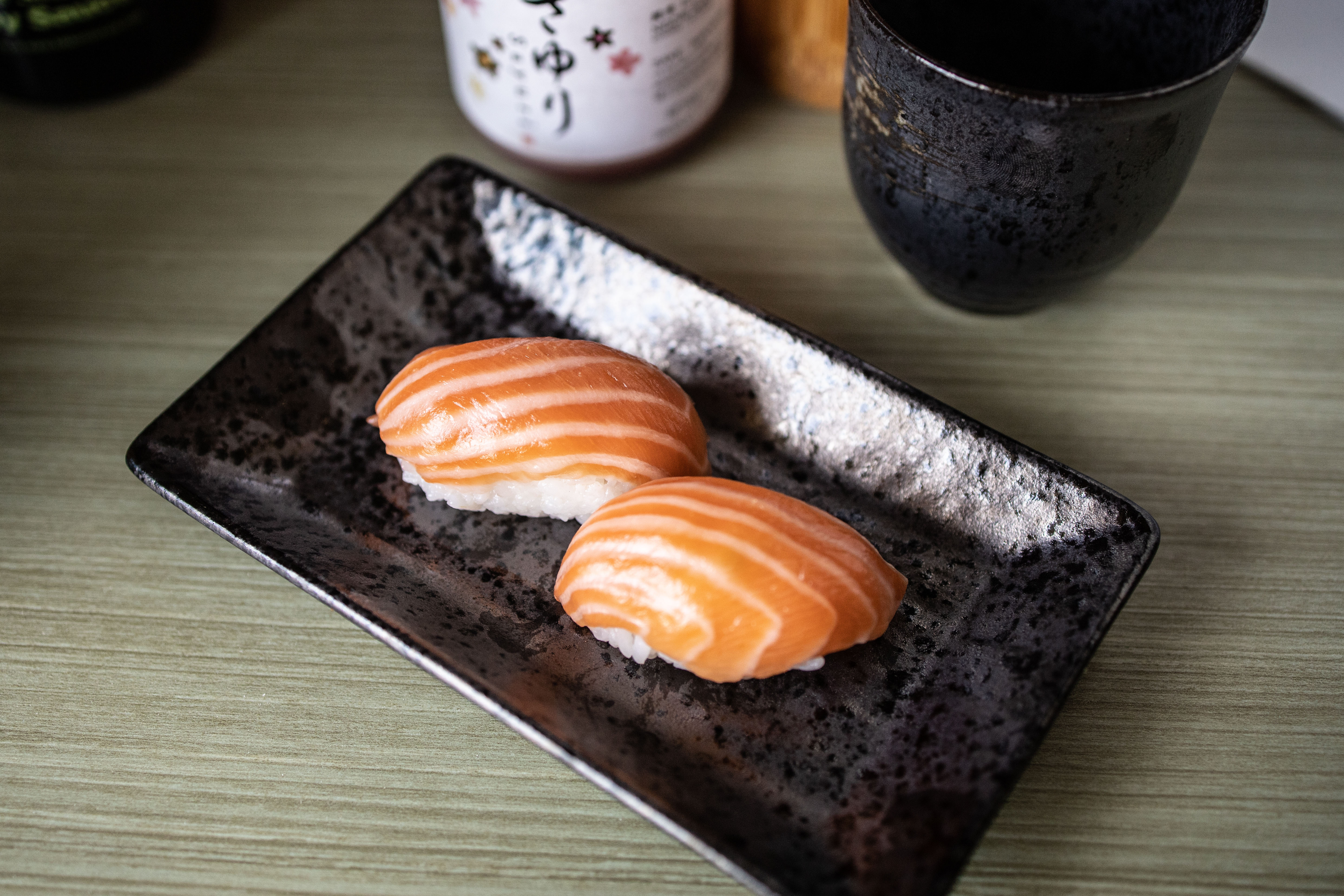 Order 1203.  salmon Nigiri Sushi food online from Yama Sushi Restaurant store, San Francisco on bringmethat.com