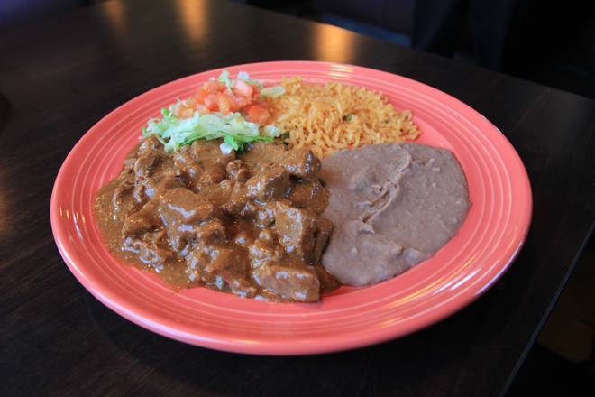 Order Carne Guisada Plate food online from Las Palapas store, San Antonio on bringmethat.com