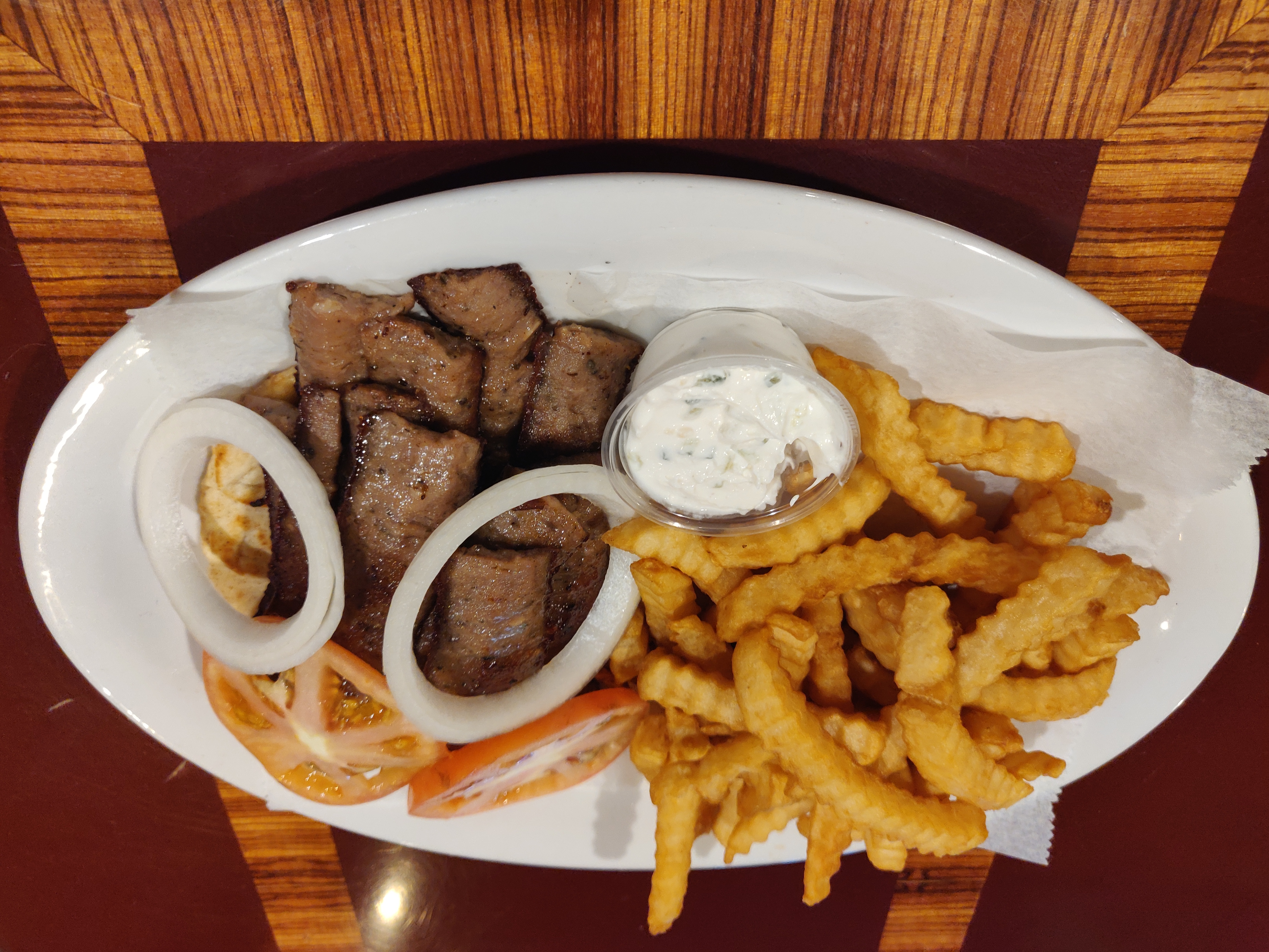 Order Gyros Plate food online from Taqueria El Ranchito store, Chicago on bringmethat.com