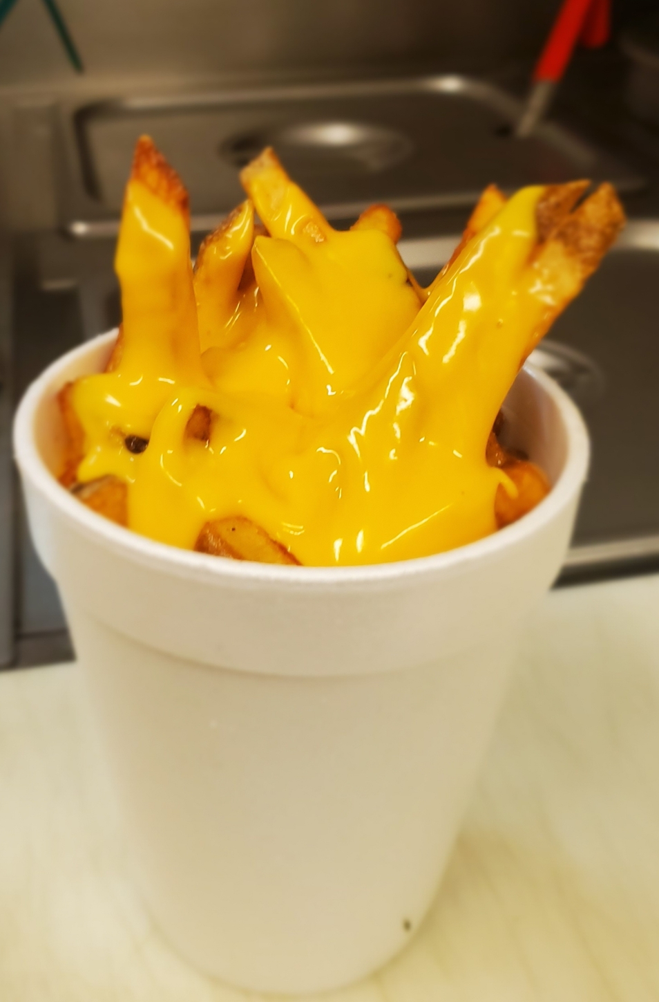 Order Cheese Fries food online from Dougs Dogs store, Oak Forest on bringmethat.com