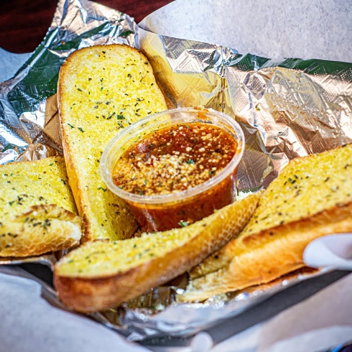Order Garlic Bread - Appetizer food online from Brothers Pizza store, Las Vegas on bringmethat.com