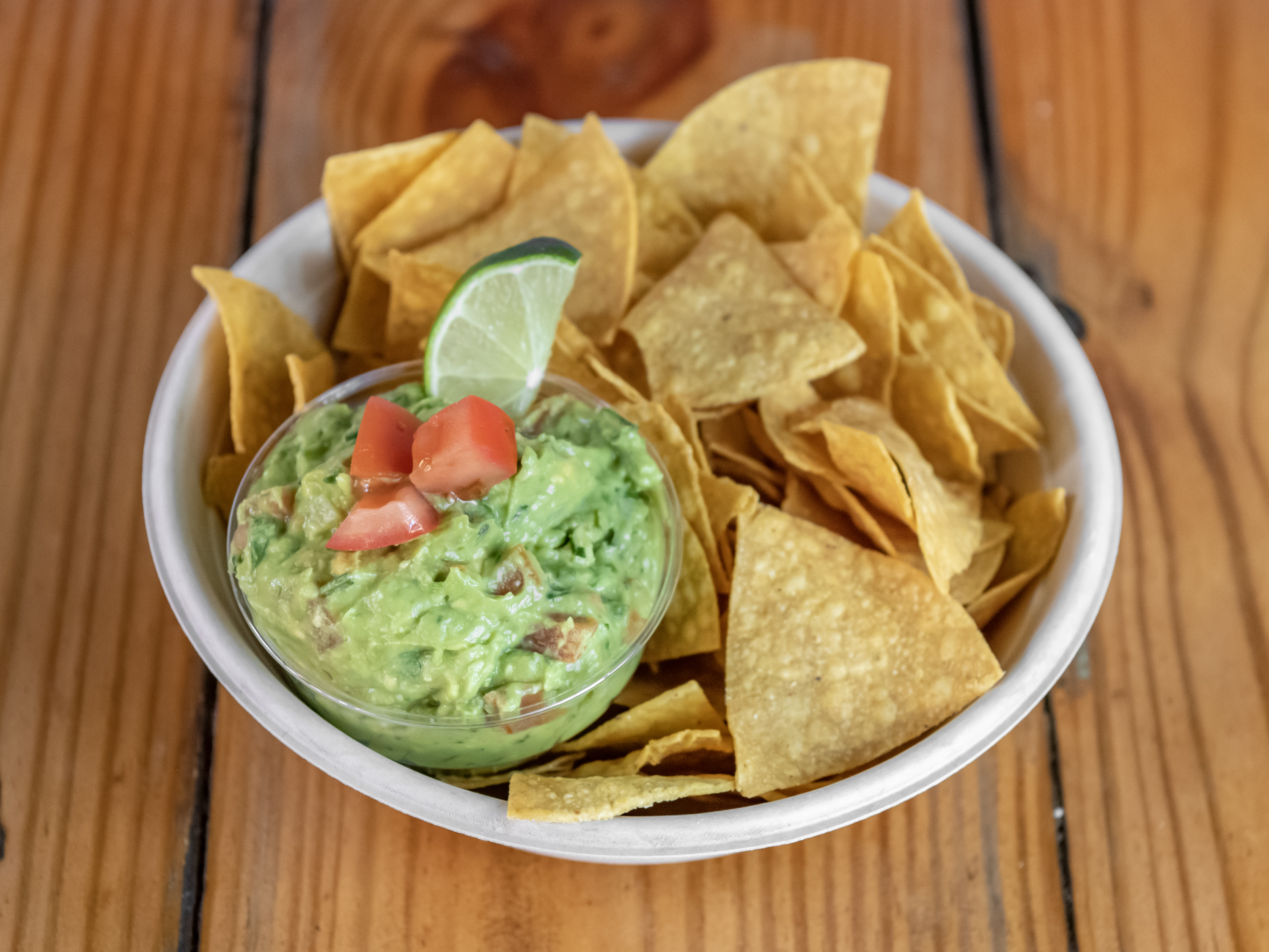 Order Chips and Guacamole food online from Fatty Daddy Taco store, Brooklyn on bringmethat.com
