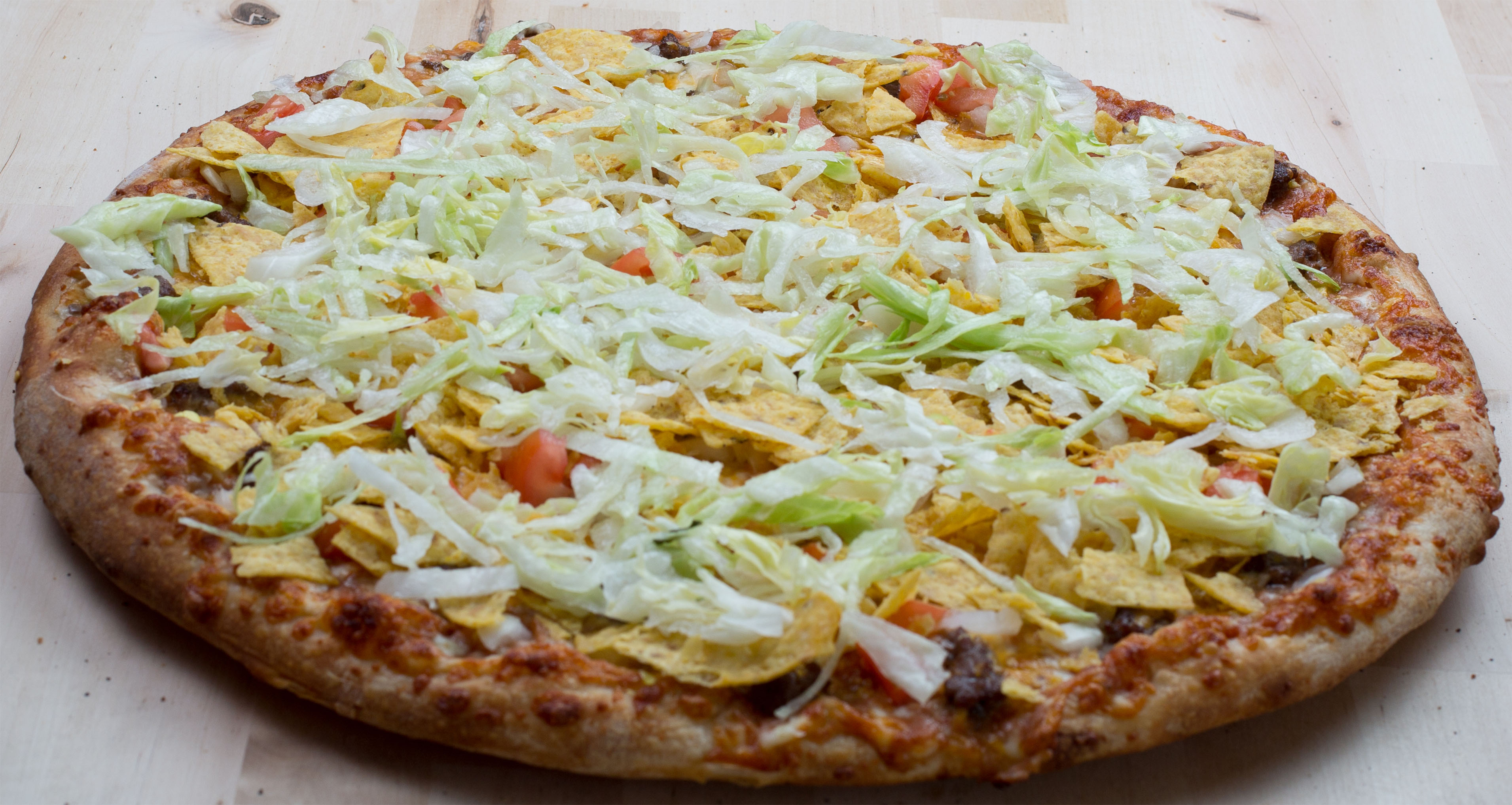 Order Taco Pizza food online from Pizza Pit Extreme store, Iowa City on bringmethat.com