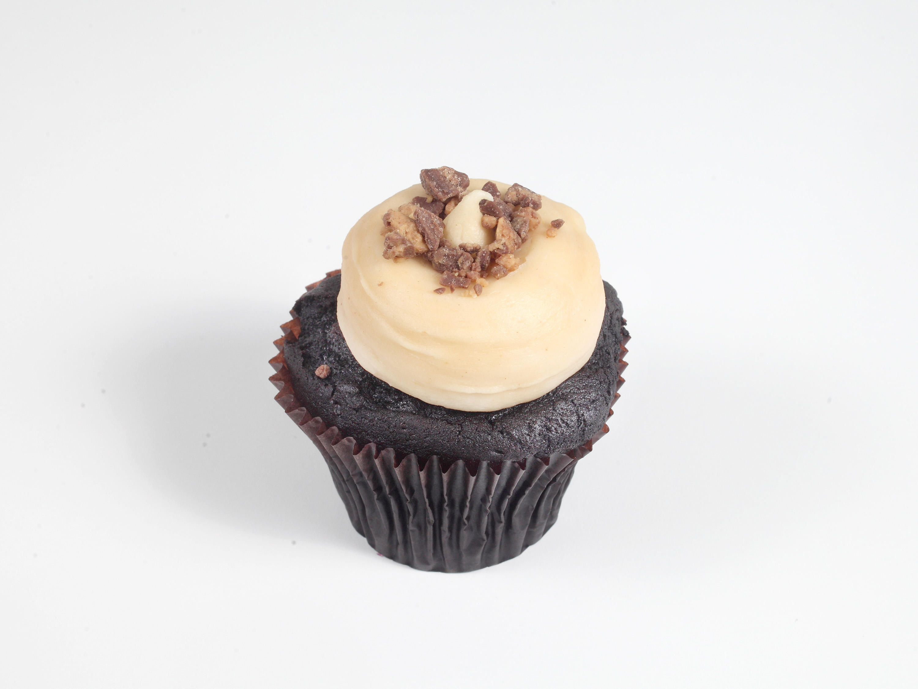 Order Peanut Butter Cup Cupcake food online from Smallcakes Steele Creek store, Charlotte on bringmethat.com