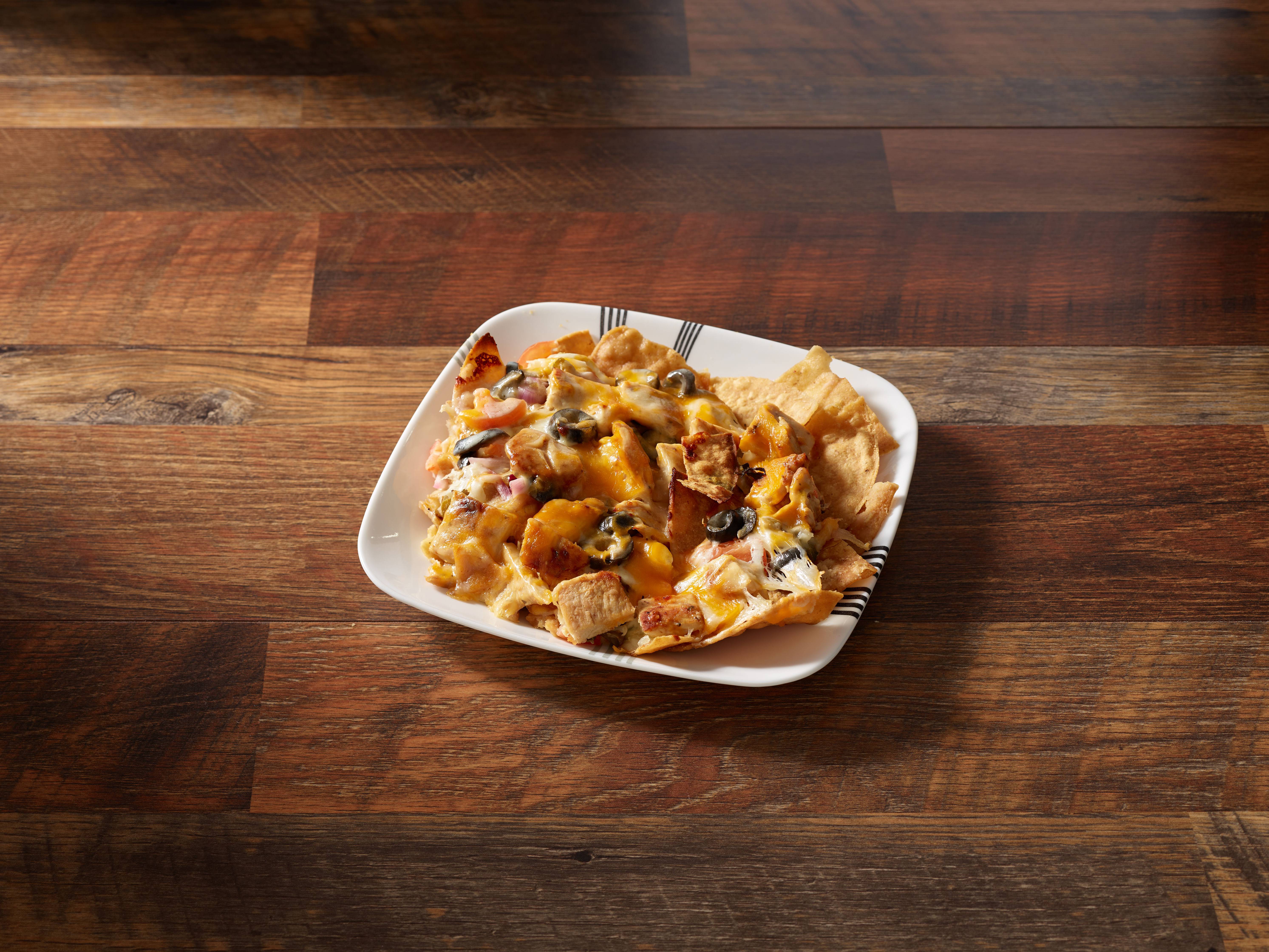 Order Loaded Nachos food online from South Whitney Pizza store, Hartford on bringmethat.com