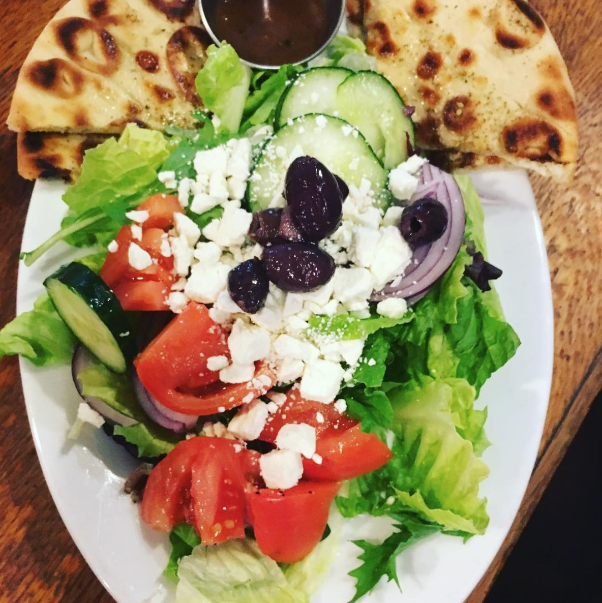 Order Greek Salad with House Baked Pita Lunch food online from Cafe La Boheme store, San Francisco on bringmethat.com