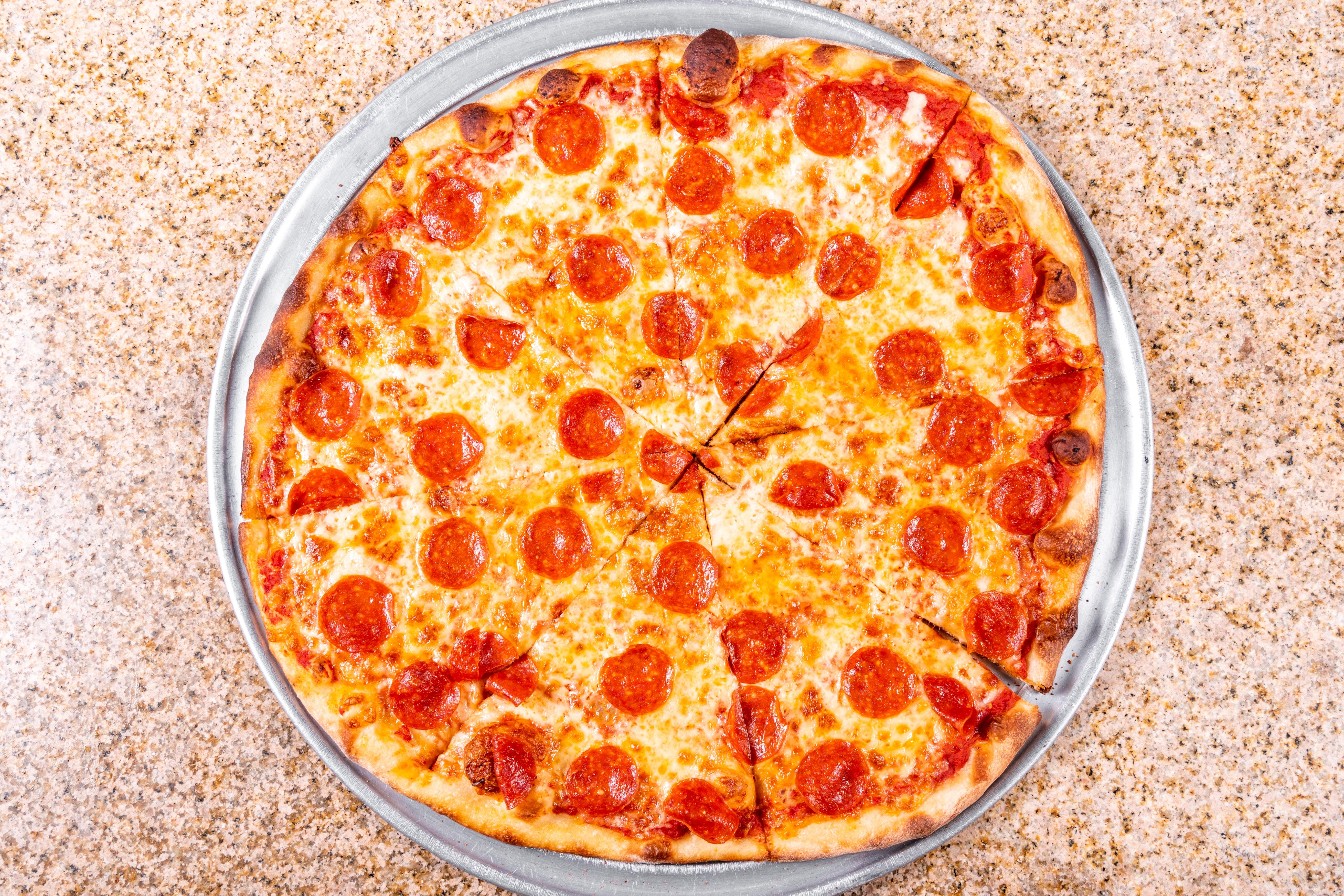 Order One Topping Pizza Slice - Slice food online from Little gio's pizza store, New York on bringmethat.com