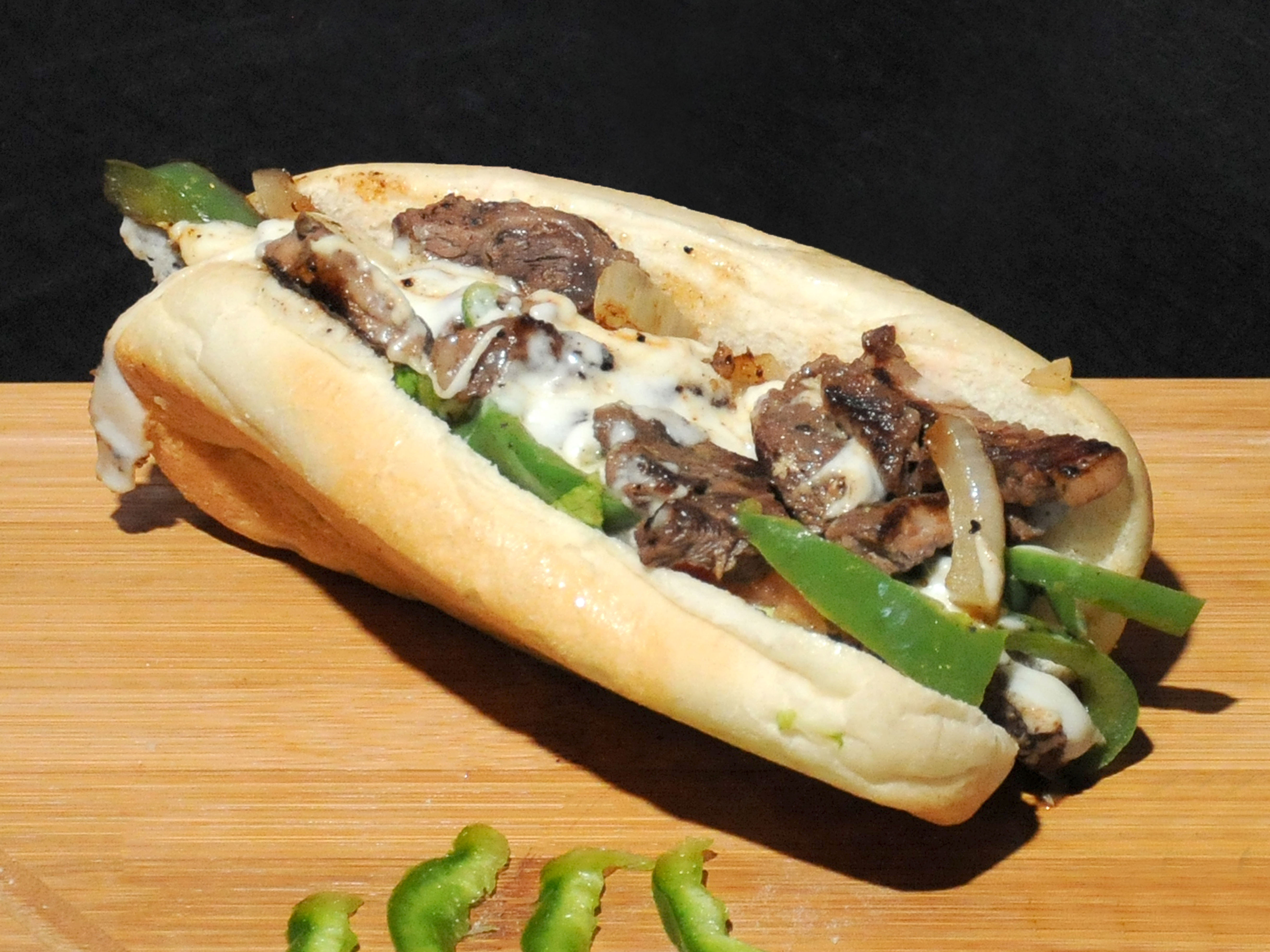 Order Steak and Cheese Sandwich with Choice of Side food online from One More Bite store, Cedar Rapids on bringmethat.com