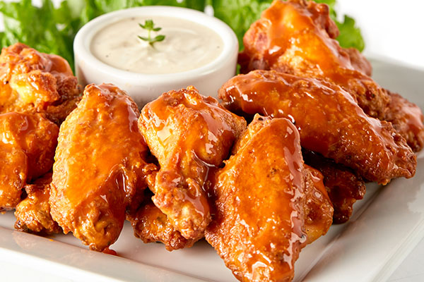 Order 12 Pieces Traditional Wings food online from Pizza Guys store, Tracy on bringmethat.com
