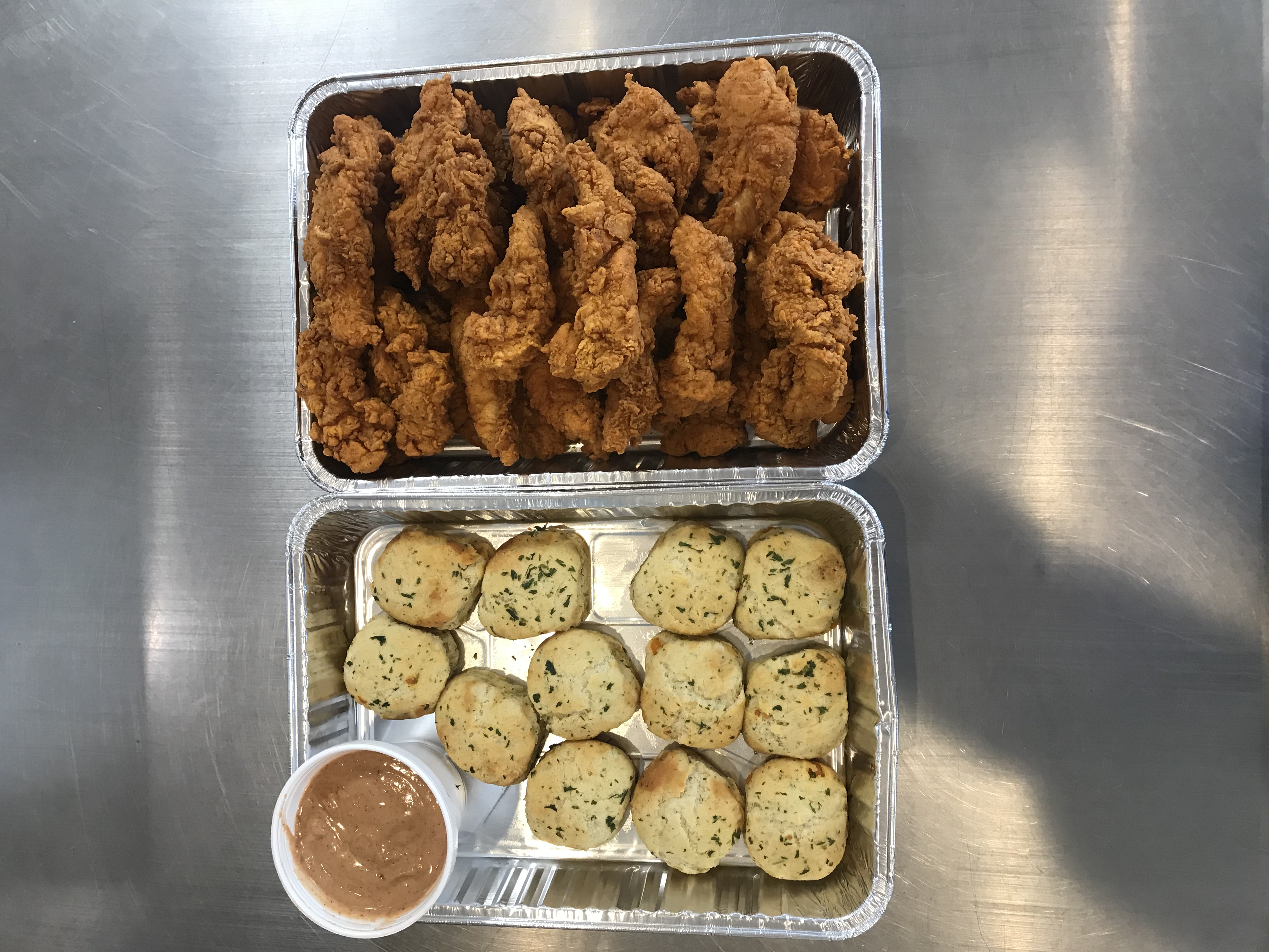 Order 25 Tenders and 12 Cheddar Biscuits food online from Cocky's Chicken and Brew store, Lincoln on bringmethat.com