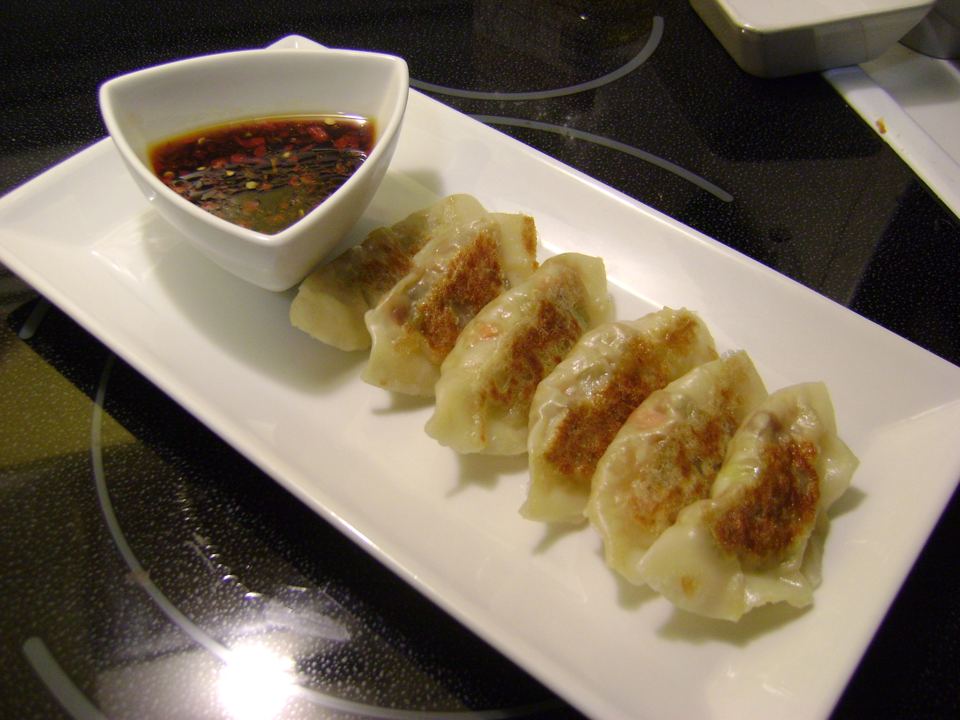Order Gyoza (6 pieces) 日式饺子 food online from Vivi Cafe store, Quincy on bringmethat.com