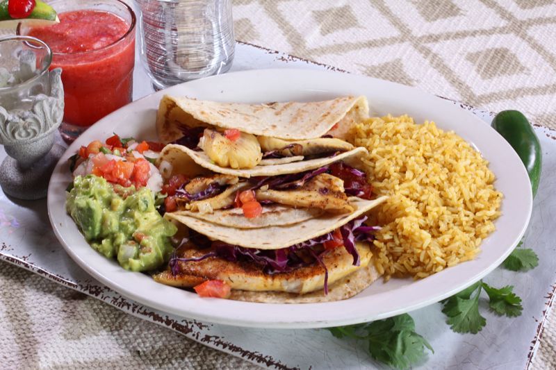 Order Fish Tacos (Large) food online from Cilantros Mexican Restaurant store, Houston on bringmethat.com