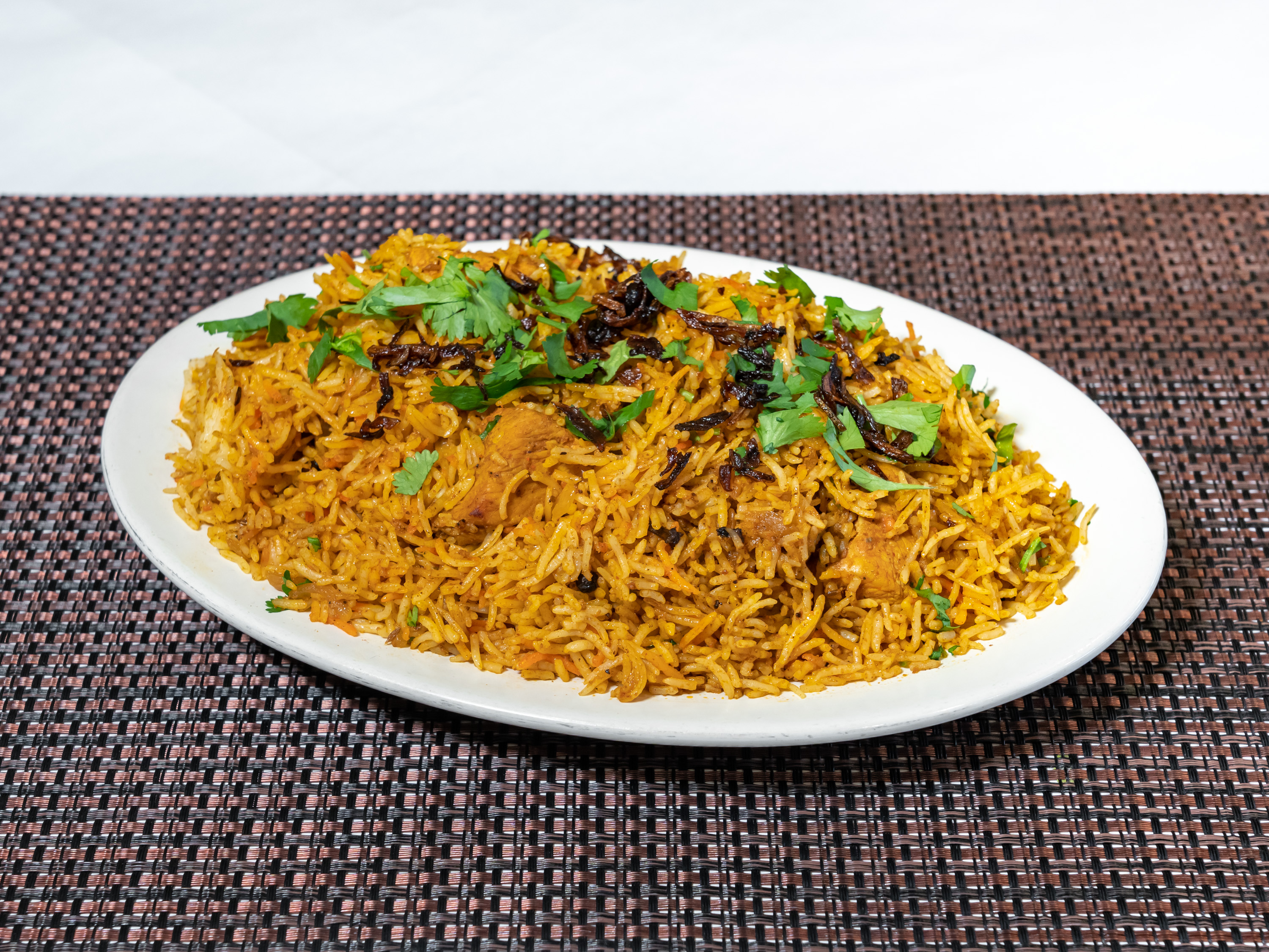 Order 55. Chicken Biryani food online from New Little India store, Shelby Township on bringmethat.com