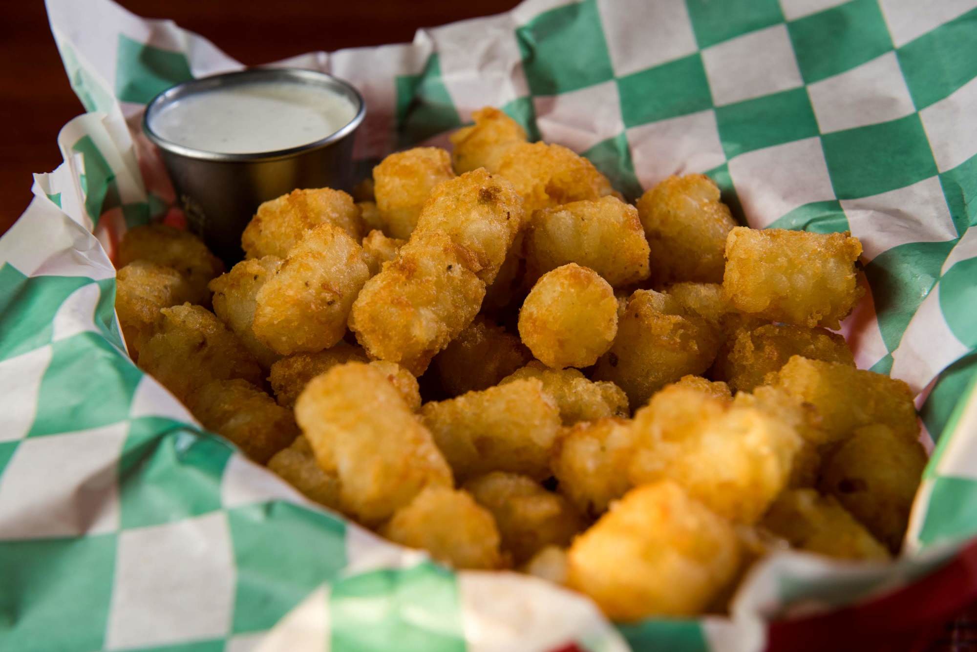 Order Tater Tots Basket food online from The Vine Tavern & Eatery store, Tempe on bringmethat.com